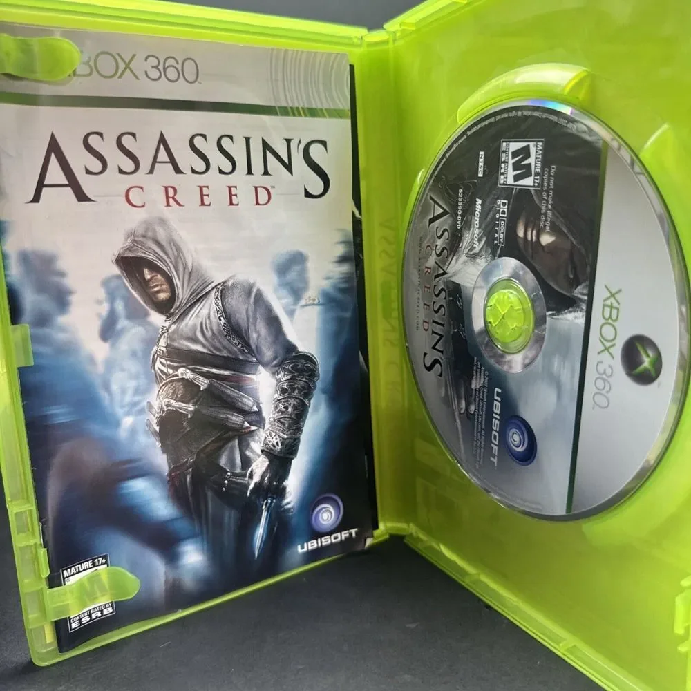 xbox  game lot Borderlands,‎ Assassin's Creed, Skyrim